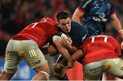 29 October 2022; James Hume of Ulster is tackled by John Hodnett and Josh Wycherley of Munster during the United Rugby Championship match between Munster and Ulster at Thomond Park in Limerick. Photo by Harry Murphy/Sportsfile