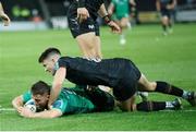 29 October 2022; Caolin Blade of Connacht scores a try despite the attempts of Reuben Morgan Williams of Ospreys during the United Rugby Championship match between Ospreys and Connacht at Swansea.com Stadium in Swansea, Wales. Photo by Gruffydd Thomas/Sportsfile