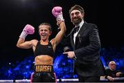 29 October 2022; Maisey Rose Courtney with MC David Diamante after her flyweight bout against Judit Hachbold at the OVO Arena Wembley in London, England. Photo by Stephen McCarthy/Sportsfile