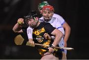 29 October 2022; Martin Kelly of TG4 Underdogs in action against Seamus Fitzgerald of Waterford during the match between TG4 Underdogs and Waterford at the SETU Arena in Waterford. Photo by Seb Daly/Sportsfile
