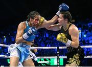 29 October 2022; Katie Taylor, right, lands a punch on Karen Elizabeth Carabajal during the final round of their undisputed lightweight championship fight at the OVO Arena Wembley in London, England. Photo by Stephen McCarthy/Sportsfile