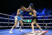 29 October 2022; Katie Taylor, right, lands a punch on Karen Elizabeth Carabajal during the final round of their undisputed lightweight championship fight at the OVO Arena Wembley in London, England. Photo by Stephen McCarthy/Sportsfile