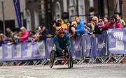 30 October 2022; Patrick Monahan from Kildare, crosses the finish line to become the 2022 Irish Life Dublin Marathon champion of the men’s wheelchair field with a time of 1:37:28. 25,000 runners took to the Fitzwilliam Square start line to participate in the 41st running of the Dublin Marathon after a two-year absence. Photo by Harry Murphy/Sportsfile