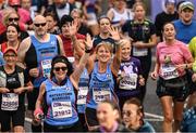 30 October 2022; Ann Battersby, 21825, and Susan Spillane, 21812, from Waterstown Warriors compete in the 2022 Irish Life Dublin Marathon. 25,000 runners took to the Fitzwilliam Square start line, to participate in the 41st running of the Dublin Marathon, after a two-year absence. Photo by Harry Murphy/Sportsfile
