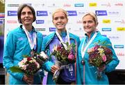 30 October 2022; 2022  Gold medallist Courtney McGuire, from Clonmel AC, centre, silver medallist Ann-Marie McGlynn, from Letterkenny AC, right, and bronze medallist Gladys Ganiel, from Antrim, with their medals respectively as the Athletics Ireland National Championships top three female finishers of the Irish Life Dublin Marathon. 25,000 runners took to the Fitzwilliam Square start line to participate in the 41st running of the Dublin Marathon after a two-year absence. Photo by Harry Murphy/Sportsfile