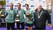 30 October 2022; Athletics Ireland President John Cronin, far right, with men's national championship medallists, gold medallist Martin Hoare, from Celbridge AC, second from left, silver medallist Conor Gallagher, second from right, and bronze medallist Sean Hehir from Croghan AC, left, with their medals respectively as the Athletics Ireland National Championships top three male finishers of the Irish Life Dublin Marathon. 25,000 runners took to the Fitzwilliam Square start line to participate in the 41st running of the Dublin Marathon after a two-year absence. Photo by Harry Murphy/Sportsfile