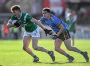 30 October 2022; Peter Cooke of Moycullen in action against Eoghan Deeley of Salthill/Knocknacarra during the Galway County Senior Club Football Championship Final match between Salthill Knocknacarra and Moycullen at Pearse Stadium in Galway. Photo by Ray Ryan/Sportsfile