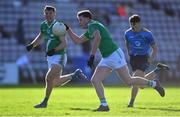 30 October 2022; Ger Davoren of Moycullen in action against Donal Hunt captain of Salthill Knocknacarra during the Galway County Senior Club Football Championship Final match between Salthill Knocknacarra and Moycullen at Pearse Stadium in Galway. Photo by Ray Ryan/Sportsfile