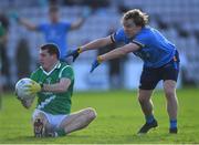 330 October 2022; Aidan Claffey of Moycullen in action against Seanie O'Leidhinn of Salthill Knocknacarra during the Galway County Senior Club Football Championship Final match between Salthill Knocknacarra and Moycullen at Pearse Stadium in Galway. Photo by Ray Ryan/Sportsfile