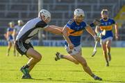 30 October 2022; Paul Flynn of Kiladangan in action against Jack Peters of Kilruane MacDonaghs during the Tipperary County Senior Club Hurling Championship Final Replay match between Kilruane MacDonaghs and Kiladangan at Semple Stadium in Thurles, Tipperary. Photo by Philip Fitzpatrick/Sportsfile