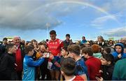 30 October 2022; David Clifford of East Kerry signs autographs for young supporters after the Kerry County Senior Football Championship Final match between East Kerry and Mid Kerry at Austin Stack Park in Tralee, Kerry. Photo by Brendan Moran/Sportsfile