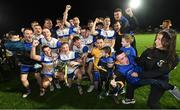 30 October 2022; Errigal Ciarán players and supporters celebrate with the O'Neill cup after the Tyrone County Senior Club Football Championship Final match between Errigal Ciarán and Carrickmore at O'Neills Healy Park in Omagh, Tyrone.  Photo by Oliver McVeigh/Sportsfile