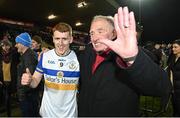 30 October 2022; Peter Harte  of Errigal Ciarán celebrates with supporter Frankie McGarvey after the Tyrone County Senior Club Football Championship Final match between Errigal Ciarán and Carrickmore at O'Neills Healy Park in Omagh, Tyrone.  Photo by Oliver McVeigh/Sportsfile