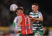 30 October 2022; Ronan Boyce of Derry City in action against Andy Lyons of Shamrock Rovers during the SSE Airtricity League Premier Division match between Shamrock Rovers and Derry City at Tallaght Stadium in Dublin. Photo by Stephen McCarthy/Sportsfile
