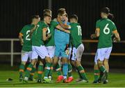30 October 2022; Republic of Ireland players celebrate with goalkeeper Joe Collins after their side's victory in the penalty shoot-out of the Victory Shield match between Republic of Ireland and Wales at the RSC in Waterford. Photo by Seb Daly/Sportsfile