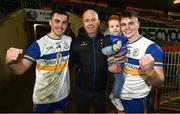 30 October 2022; Darragh and Ruairi Canavan of Errigal Ciarán with their father Peter and niece Ava Harte after the Tyrone County Senior Club Football Championship Final match between Errigal Ciarán and Carrickmore at O'Neills Healy Park in Omagh, Tyrone.  Photo by Oliver McVeigh/Sportsfile