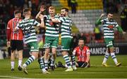 30 October 2022; Rory Gaffney, centre, celebrates with Shamrock Rovers team-mates Andy Lyons, left, and Richie Towell after scoring their side's first goal during the SSE Airtricity League Premier Division match between Shamrock Rovers and Derry City at Tallaght Stadium in Dublin. Photo by Stephen McCarthy/Sportsfile