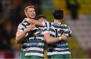 30 October 2022; Rory Gaffney, left, celebrates with Shamrock Rovers team-mates Andy Lyons, centre, and Richie Towell, right, after scoring their side's first goal during the SSE Airtricity League Premier Division match between Shamrock Rovers and Derry City at Tallaght Stadium in Dublin. Photo by Stephen McCarthy/Sportsfile