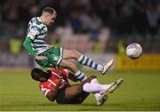 30 October 2022; Sean Kavanagh of Shamrock Rovers is tackled by Sadou Diallo of Derry City during the SSE Airtricity League Premier Division match between Shamrock Rovers and Derry City at Tallaght Stadium in Dublin. Photo by Stephen McCarthy/Sportsfile