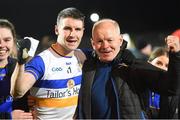30 October 2022; Errigal Ciarán captain Tommy Canavan and his father Stevie Canavan celebrate after the Tyrone County Senior Club Football Championship Final match between Errigal Ciarán and Carrickmore at O'Neills Healy Park in Omagh, Tyrone.  Photo by Oliver McVeigh/Sportsfile