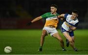 30 October 2022; James Donaghy of Carrickmore in action against Pauric Traynor of Errigal Ciarán during the Tyrone County Senior Club Football Championship Final match between Errigal Ciarán and Carrickmore at O'Neills Healy Park in Omagh, Tyrone.  Photo by Oliver McVeigh/Sportsfile