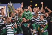 30 October 2022; Shamrock Rovers captain Ronan Finn lifts the trophy as Shamrock Rovers manager Stephen Bradley lifts his son Josh Bradley after the SSE Airtricity League Premier Division match between Shamrock Rovers and Derry City at Tallaght Stadium in Dublin. Photo by Ramsey Cardy/Sportsfile