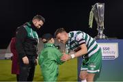 30 October 2022; Ronan Finn of Shamrock Rovers with Josh Bradley, son of manager Stephen Bradley, after the SSE Airtricity League Premier Division match between Shamrock Rovers and Derry City at Tallaght Stadium in Dublin. Photo by Ramsey Cardy/Sportsfile