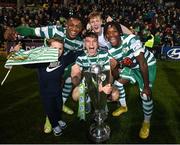 30 October 2022; Shamrock Rovers players, from left, Aidomo Emakhu, Justin Ferizaj, Tom Leitis and Gideon Tetteh with the SSE Airtricity League Premier Division trophy after the SSE Airtricity League Premier Division match between Shamrock Rovers and Derry City at Tallaght Stadium in Dublin. Photo by Stephen McCarthy/Sportsfile