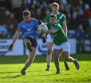 30 October 2022; Eoin McFadden of Salthill Knocknacarra in action against Dessie Conneely captain of Moycullen during the Galway County Senior Club Football Championship Final match between Salthill Knocknacarra and Moycullen at Pearse Stadium in Galway. Photo by Ray Ryan/Sportsfile