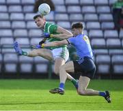 30 October 2022; Owen Gallagher of Moycullen in action against Donal Hunt captain of Salthill Knocknacarra during the Galway County Senior Club Football Championship Final match between Salthill Knocknacarra and Moycullen at Pearse Stadium in Galway. Photo by Ray Ryan/Sportsfile