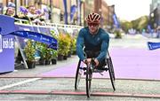 30 October 2022; Patrick Monahan from Kildare, crosses the finish line to become the 2022 Irish Life Dublin Marathon champion of the men’s wheelchair field with a time of 1:37:28. 25,000 runners took to the Fitzwilliam Square start line to participate in the 41st running of the Dublin Marathon after a two-year absence. Photo by Sam Barnes/Sportsfile