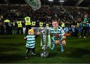 30 October 2022; Viktor Serdeniuk of Shamrock Rovers and son Alex celebrate with the SSE Airtricity League Premier Division trophy  after the SSE Airtricity League Premier Division match between Shamrock Rovers and Derry City at Tallaght Stadium in Dublin. Photo by Stephen McCarthy/Sportsfile
