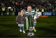30 October 2022; Ronan Finn of Shamrock Rovers and daughters Mia, left, and Emmi celebrate with the SSE Airtricity League Premier Division trophy after the SSE Airtricity League Premier Division match between Shamrock Rovers and Derry City at Tallaght Stadium in Dublin. Photo by Stephen McCarthy/Sportsfile