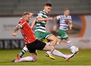30 October 2022; Justin Ferizaj of Shamrock Rovers in action against Mark Connolly of Derry City during the SSE Airtricity League Premier Division match between Shamrock Rovers and Derry City at Tallaght Stadium in Dublin. Photo by Stephen McCarthy/Sportsfile
