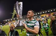 30 October 2022; Aaron Greene of Shamrock Rovers celebrates with the SSE Airtricity League trophy after the SSE Airtricity League Premier Division match between Shamrock Rovers and Derry City at Tallaght Stadium in Dublin. Photo by Ramsey Cardy/Sportsfile