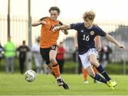 4 November 2022; Matthew Murray of Republic of Ireland in action against Sam Chambers of Scotland during the Victory Shield match between Republic of Ireland and Scotland at Tramore AFC in Tramore, Waterford. Photo by Matt Browne/Sportsfile