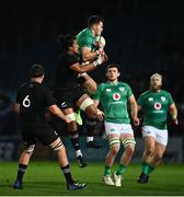 4 November 2022; Jacob Stockdale of Ireland catches a high all ahead of Marino Mikaele-Tu’u of All Blacks during the match between Ireland A and All Blacks XV at RDS Arena in Dublin. Photo by David Fitzgerald/Sportsfile