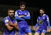 4 November 2022; Wassim Aouachria, left, of Waterford celebrates after scoring his side's second goal with teammates Phoenix Patterson, centre, and Yassine En Neyah during the SSE Airtricity League First Division play-off final match between Waterford and Galway United at Markets Field in Limerick. Photo by Michael P Ryan/Sportsfile