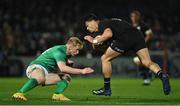 4 November 2022; AJ Lam of All Blacks is tackled by Jamie Osborne of Ireland during the match between Ireland A and All Blacks XV at RDS Arena in Dublin. Photo by Brendan Moran/Sportsfile