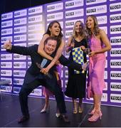 4 November 2022; Clare players, from left, Fidelma Marrinan, Tara Kelly and Aisling Reidy with MC Marty Morrissey at the 2022 TG4 Teams of the Championship awards night at Croke Park, Dublin. Photo by Seb Daly/Sportsfile