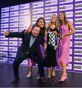 4 November 2022; Clare players, from left, Fidelma Marrinan, Tara Kelly and Aisling Reidy with MC Marty Morrissey at the 2022 TG4 Teams of the Championship awards night at Croke Park, Dublin. Photo by Seb Daly/Sportsfile