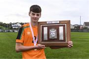 4 November 2022; Egor Vassenin of Republic of Ireland with the Victory Shield after the Victory Shield match between Republic of Ireland and Scotland at Tramore AFC in Tramore, Waterford. Photo by Matt Browne/Sportsfile