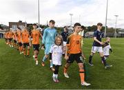 4 November 2022; Republic of Ireland captain Matthew Moore leads his team-mates out for the start of the Victory Shield match between Republic of Ireland and Scotland at Tramore AFC in Tramore, Waterford. Photo by Matt Browne/Sportsfile