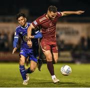 4 November 2022; Max Hemmings of Galway United in action against Phoenix Patterson of Waterford during the SSE Airtricity League First Division play-off final match between Waterford and Galway United at Markets Field in Limerick. Photo by John Sheridan /Sportsfile