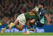 5 November 2022; Robert Baloucoune of Ireland is tackled by Jesse Kriel of South Africa during the Bank of Ireland Nations Series match between Ireland and South Africa at the Aviva Stadium in Dublin. Photo by Ramsey Cardy/Sportsfile