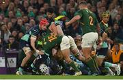 5 November 2022; Mack Hansen of Ireland is tackled by Cheslin Kolbe, 15, and Pieter-Steph du Toiti of South Africa during the Bank of Ireland Nations Series match between Ireland and South Africa at the Aviva Stadium in Dublin. Photo by Seb Daly/Sportsfile