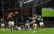 5 November 2022; Jimmy O'Brien of Ireland clears under pressure from Eben Etzebeth of South Africa during the Bank of Ireland Nations Series match between Ireland and South Africa at the Aviva Stadium in Dublin. Photo by Ramsey Cardy/Sportsfile