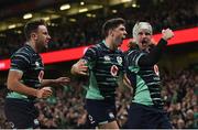5 November 2022; Mack Hansen of Ireland, right, celebrates with teammates Jimmy O'Brien, centre, and Hugo Keenan after scoring their side's second try during the Bank of Ireland Nations Series match between Ireland and South Africa at the Aviva Stadium in Dublin. Photo by Seb Daly/Sportsfile
