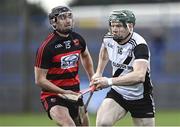 6 November 2022; Thomas Cleary of Kilruane MacDonagh's in action against Pauric Mahony of Ballygunner during the AIB Munster GAA Hurling Senior Club Championship quarter-final match between Ballygunner and Kilruane MacDonagh's at Walsh Park in Waterford. Photo by Piaras Ó Mídheach/Sportsfile