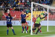 6 November 2022; Jessie Stapleton of Shelbourne scores her side's first goal despite the efforts of Athlone Town goalkeeper Niamh Coombes during the EVOKE.ie FAI Women's Cup Final match between Shelbourne and Athlone Town at Tallaght Stadium in Dublin. Photo by Stephen McCarthy/Sportsfile